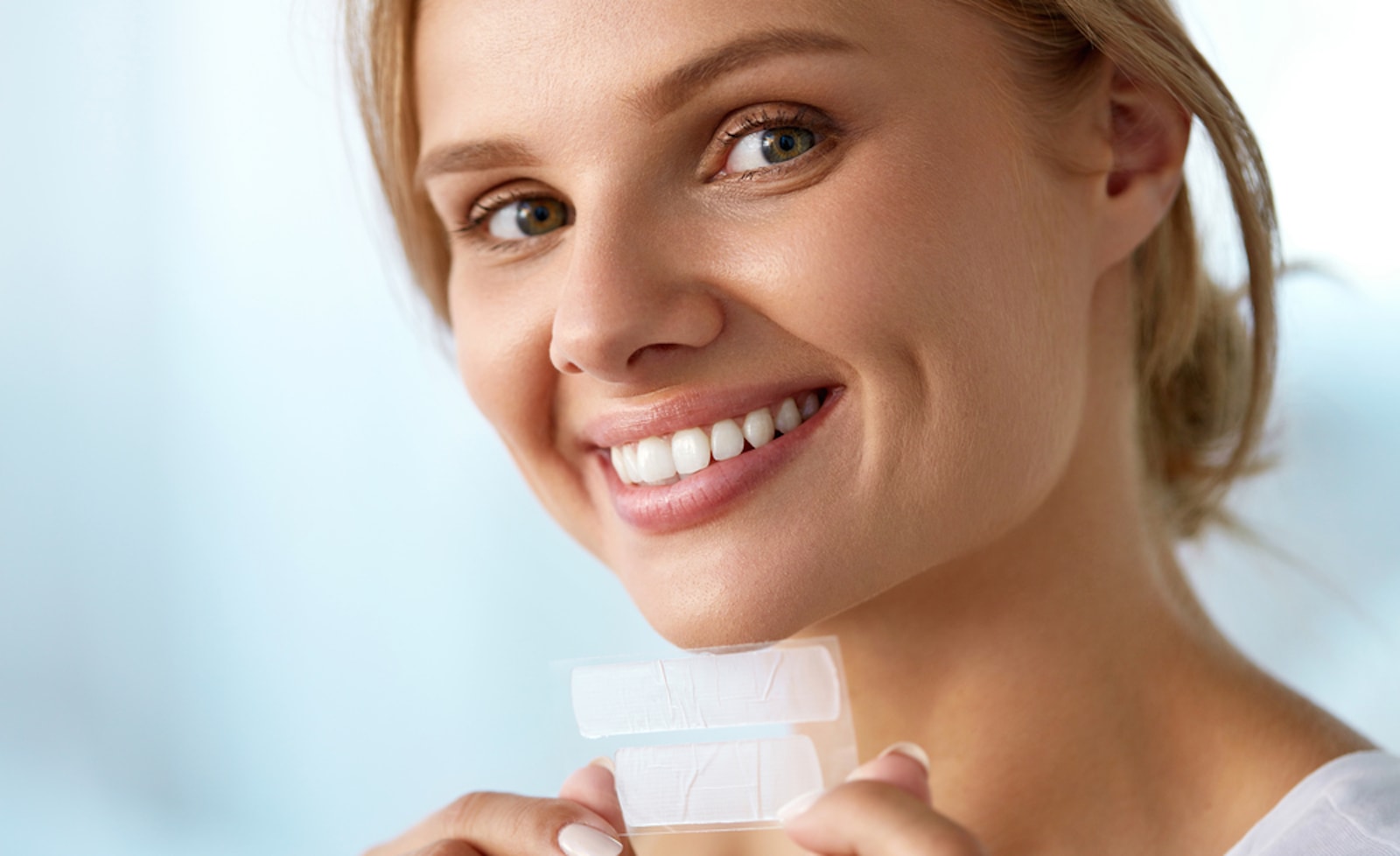 Learn if whitening strips can damage layers of the teeth